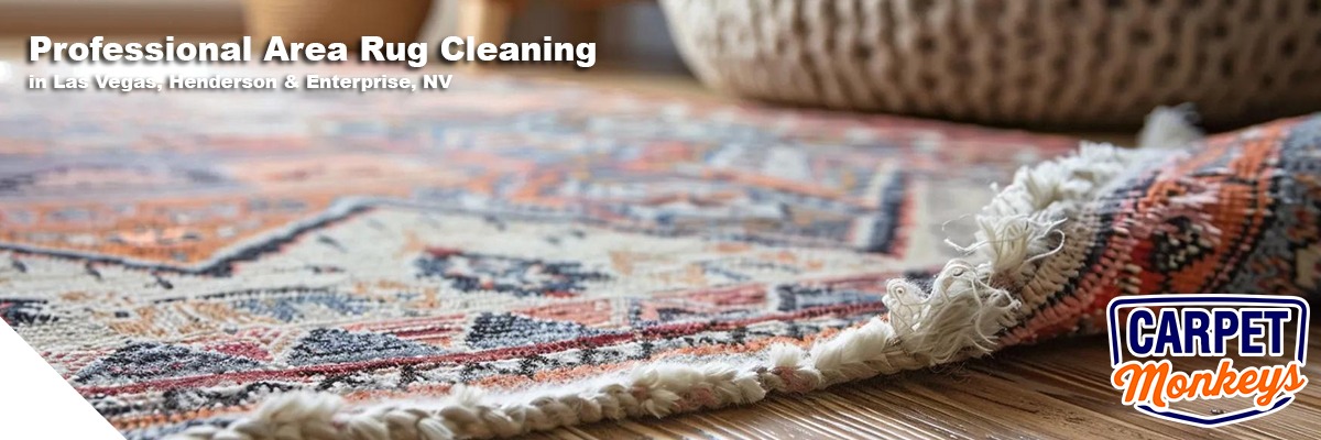 Professional area rug cleaning service featuring a detailed, colorful rug with fringed edges, emphasizing cleanliness and care, with "Carpet Monkeys" logo and text highlighting services in Las Vegas, Henderson, and Enterprise, NV.