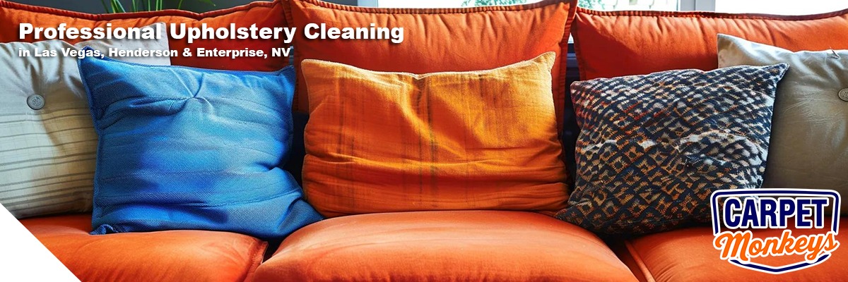 Professional upholstery cleaning service showcasing a vibrant sofa with colorful cushions, emphasizing The Carpet Monkeys brand in Las Vegas, Henderson, and Enterprise, NV.
